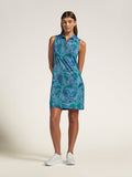 Blue sleeveless solid dress with white sneakers, full body view on plain background