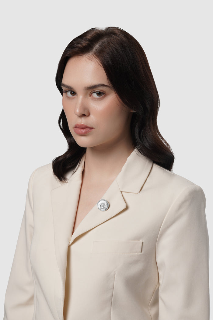 liora pin brooch in white marble by buttonscarves on blazer