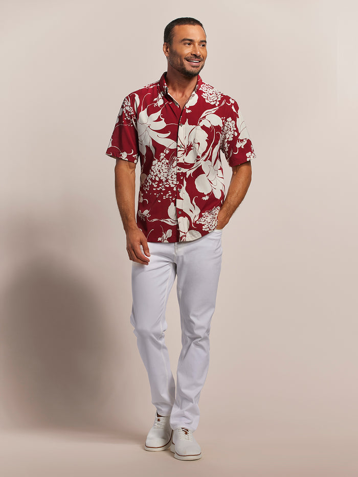 Red and white floral-print short-sleeve Hawaiian shirt Magic Moment Tradewind Technology®, front view, hand in pocket.