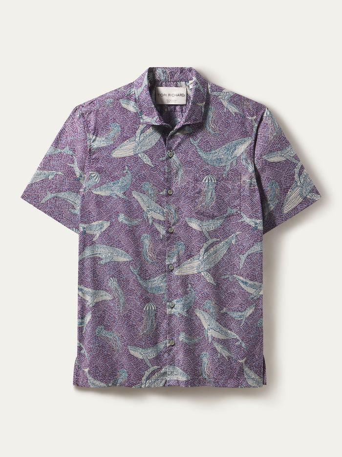 Purple cotton shirt with blue whale and Japanese print, front view on white background.