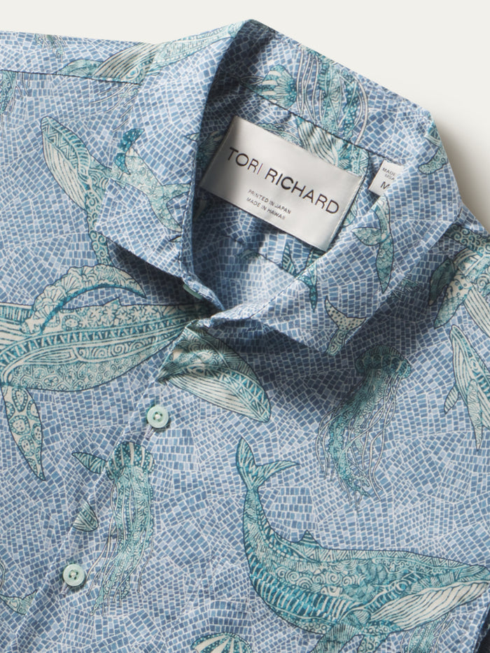 Blue whale and leaf-print cotton shirt, front view.