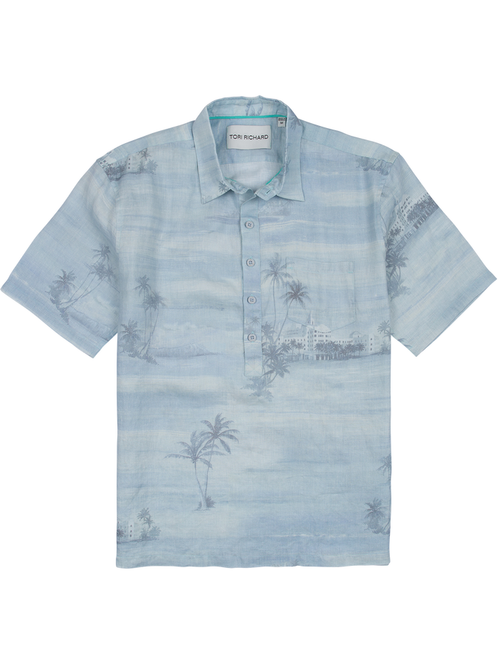 Light blue palm tree and Royal Hawaiian print linen shirt with buttoned collar, front view