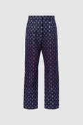 monogram denim pants in fuchsia by buttonscarves