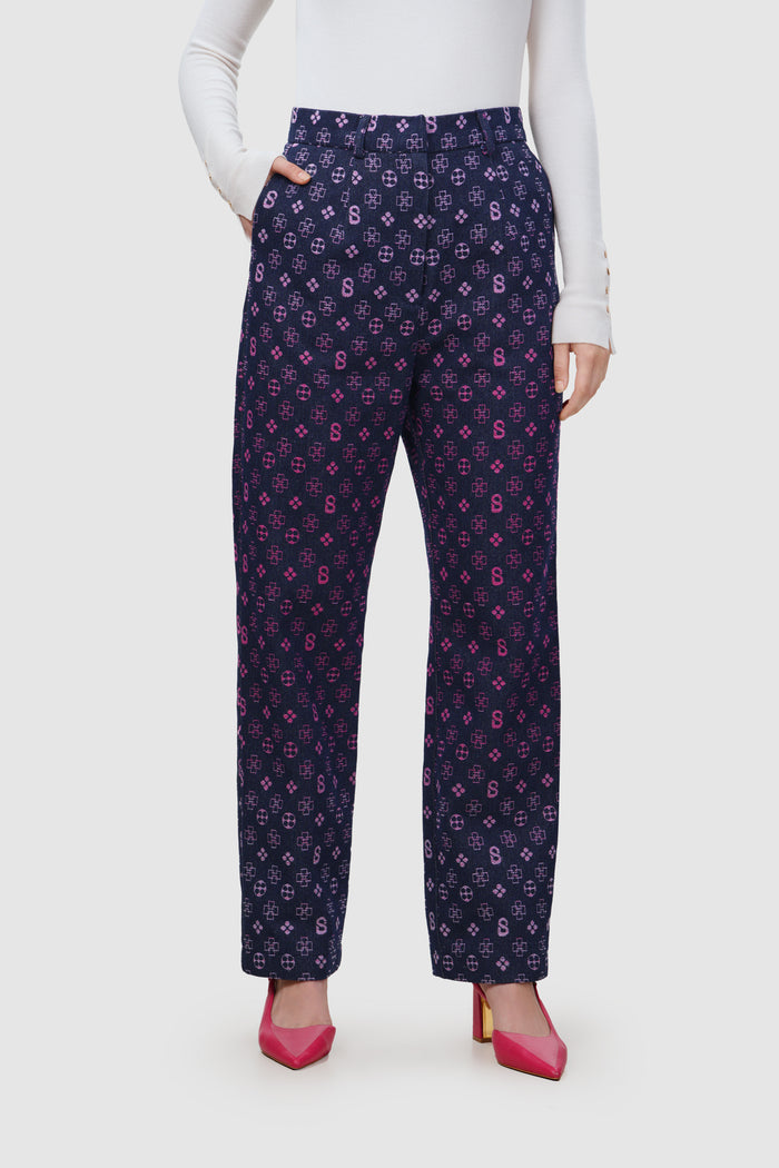 monogram denim pants in fuchsia by buttonscarves front view