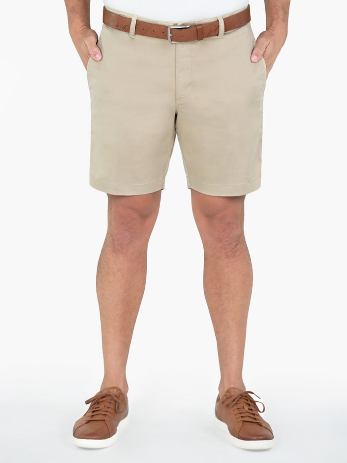 Tan solid cotton/Tencel shorts, 8 inseam, partial front view with brown sneakers.