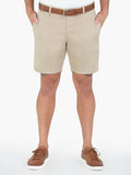 Tan solid cotton/Tencel shorts, 8 inseam, partial front view with brown sneakers.