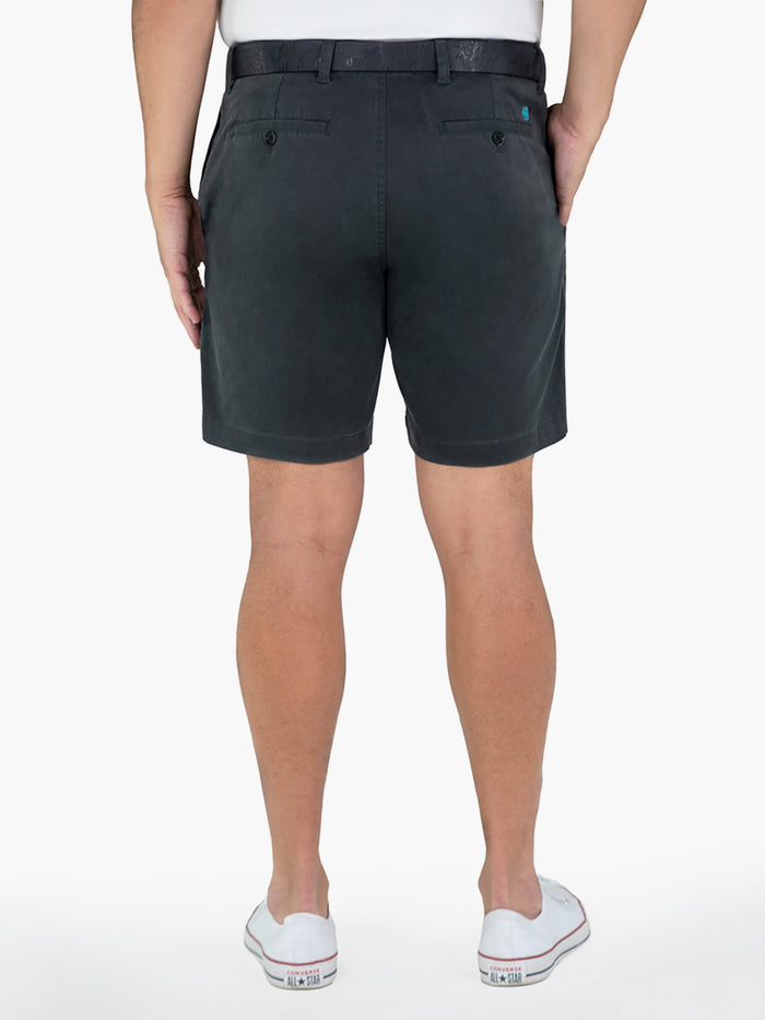 Charcoal solid Monte Carlo 8 shorts with white shirt and slip-ons, back view.