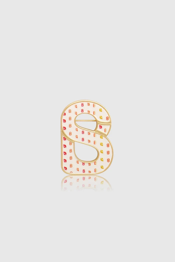 nagita brooch package in gliding gold by buttonscarves x nagita slavina signature b logo front view