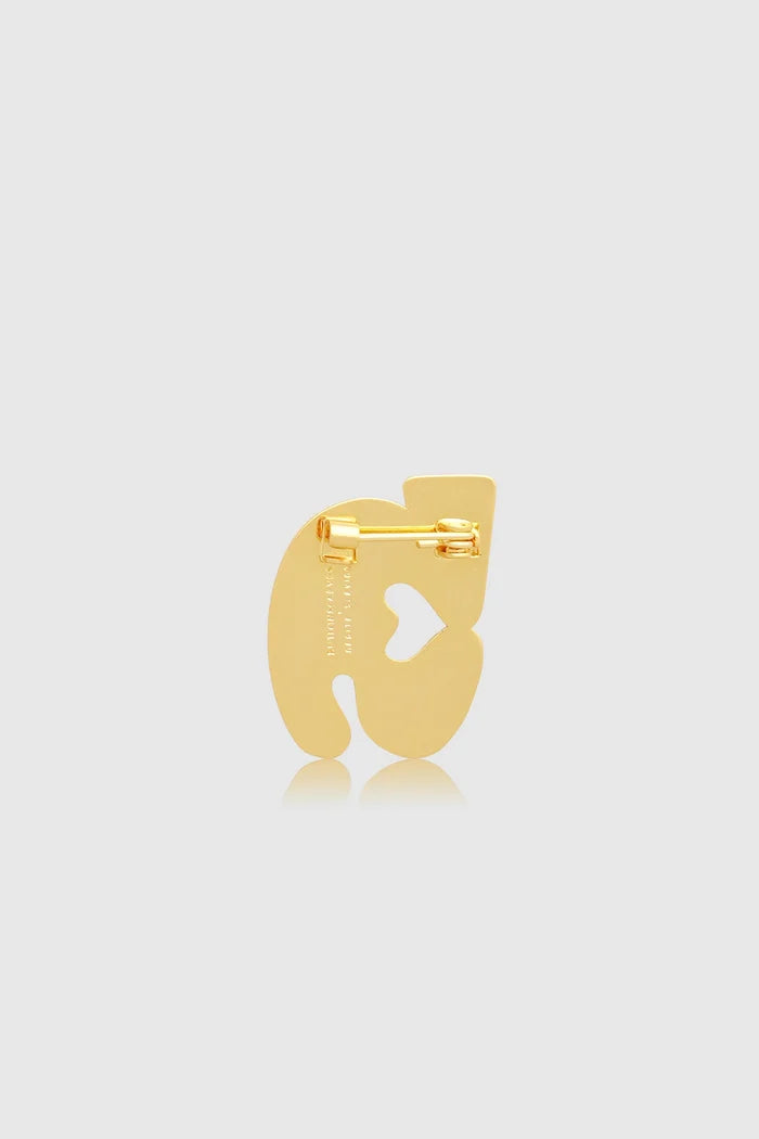 nagita brooch package in gliding gold by buttonscarves x nagita slavina signature nagita slavina monogram back view
