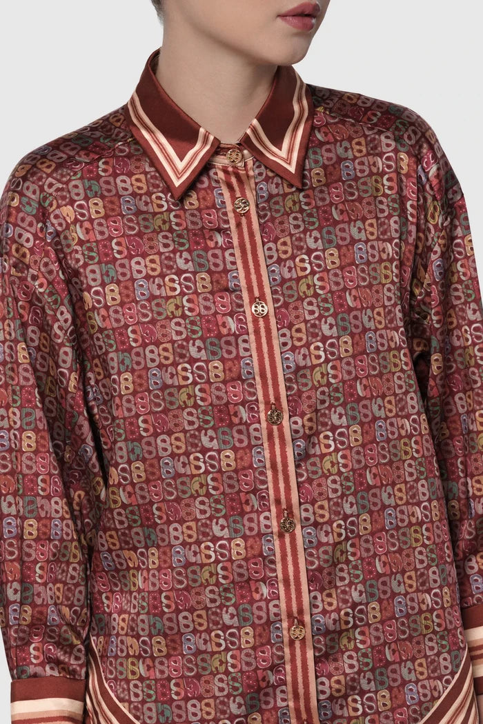 nagita oversized shirt in pomegranate by buttonscarves x nagita slavina monogram pattern detail