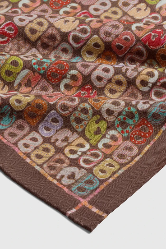 nagita wool scarf in chestnut by buttonscarves x nagita slavina monogram pattern detail