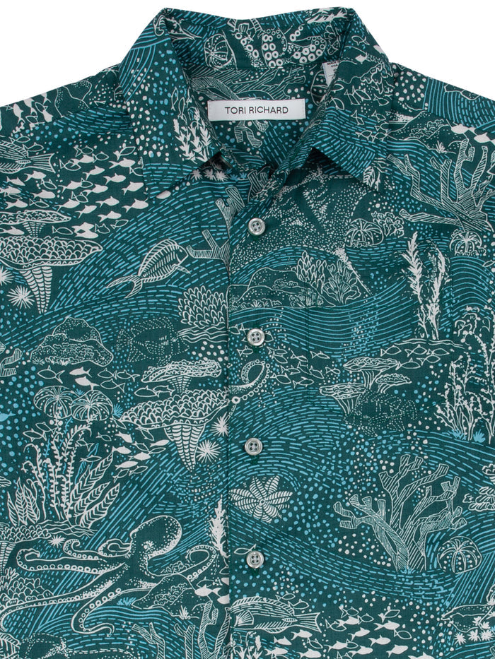 Green shirt, white ocean print, short sleeves, Hawaiian style, cotton, front view.