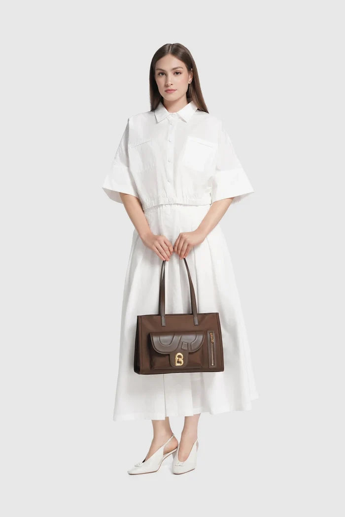 nara tote bag in brown by buttonscarves carried by hand style