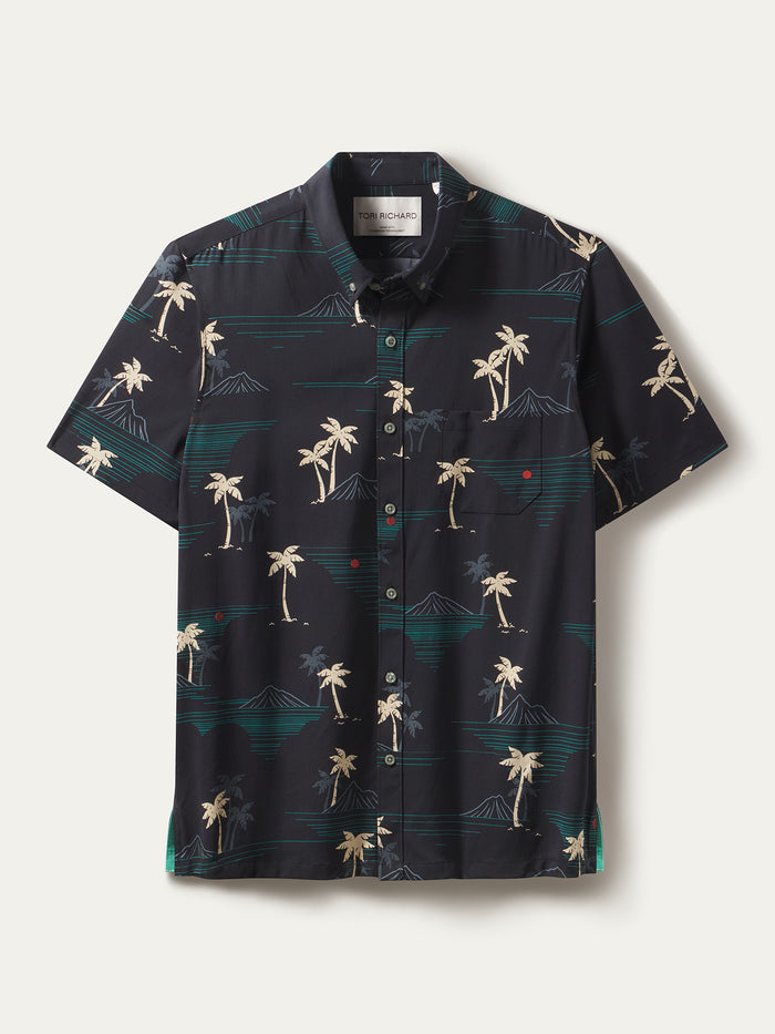 Black short-sleeve shirt with beige palm and teal mountain print, palm print, moisture-wicking fabric, front view.