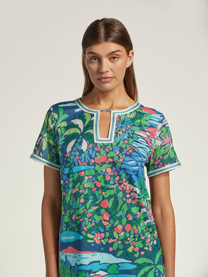 Opalescent floral-print dress with notched neckline, shown on model, front view.
