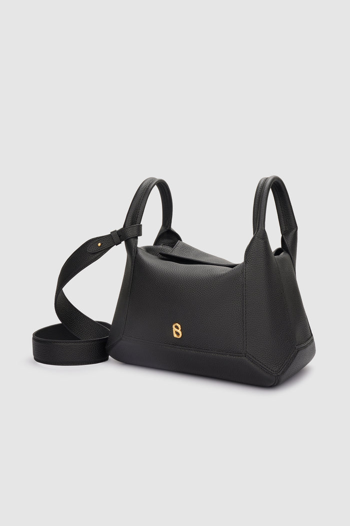 origa flex shoulder bag in black by buttonscarves front view