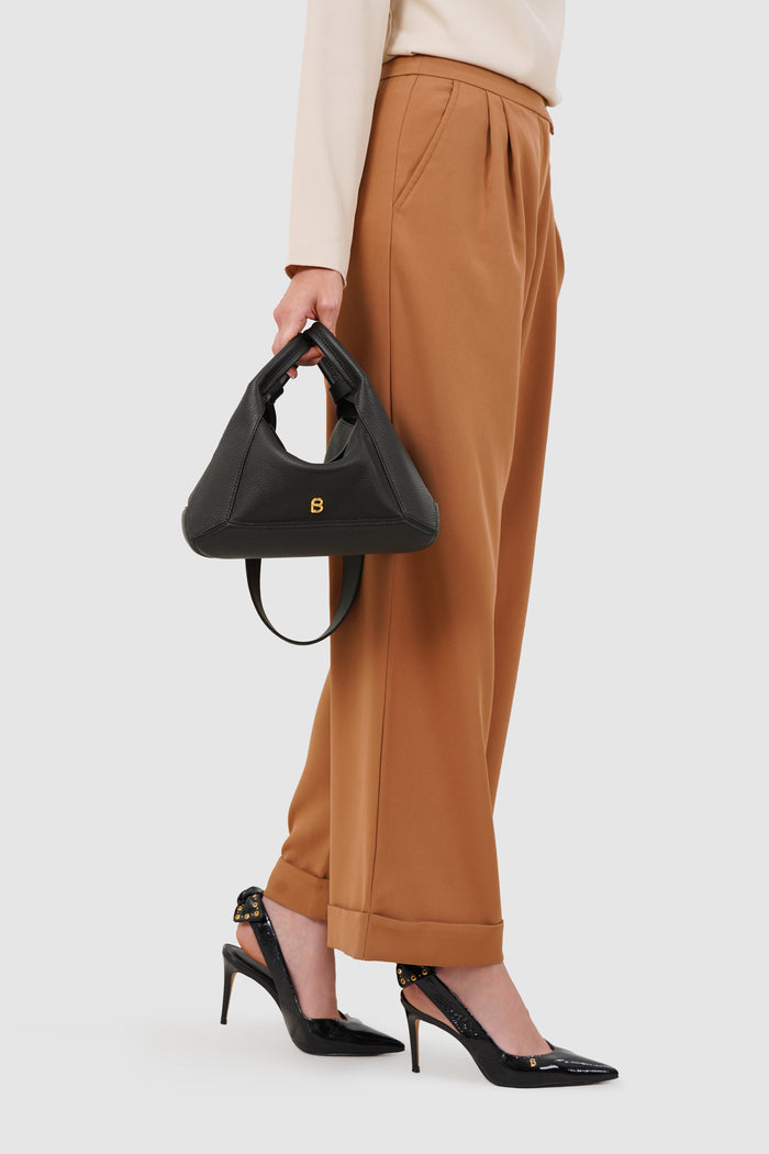 origa flex shoulder bag in black by buttonscarves hand carried style