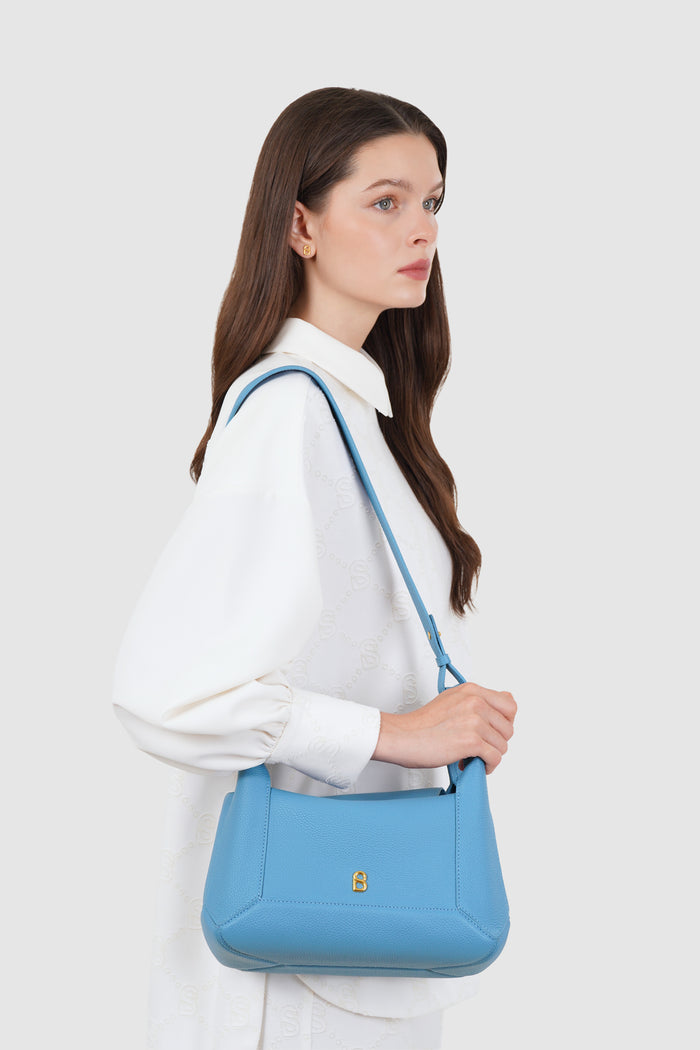 origa flex shoulder bag in limoges by buttonscarves carried on shoulder