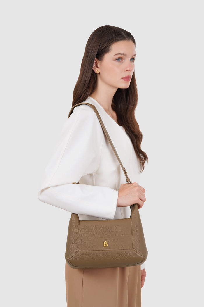 origa flex shoulder bag in rock by buttonscarves carried on shoulder