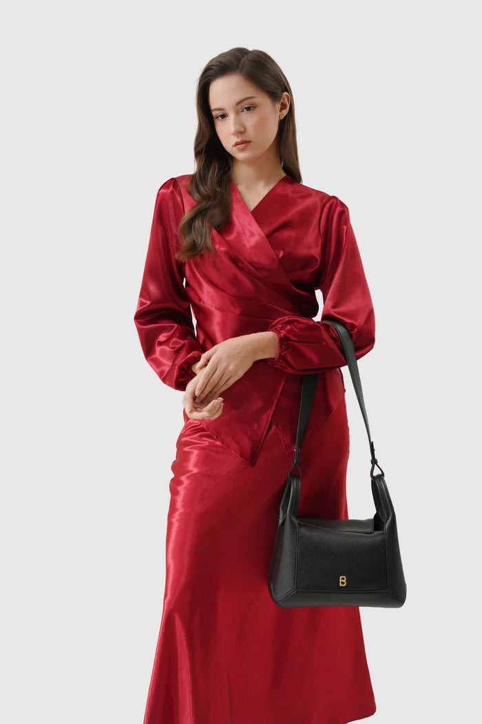 origa flex shoulder bag medium in black by buttonscarves carried on wrist