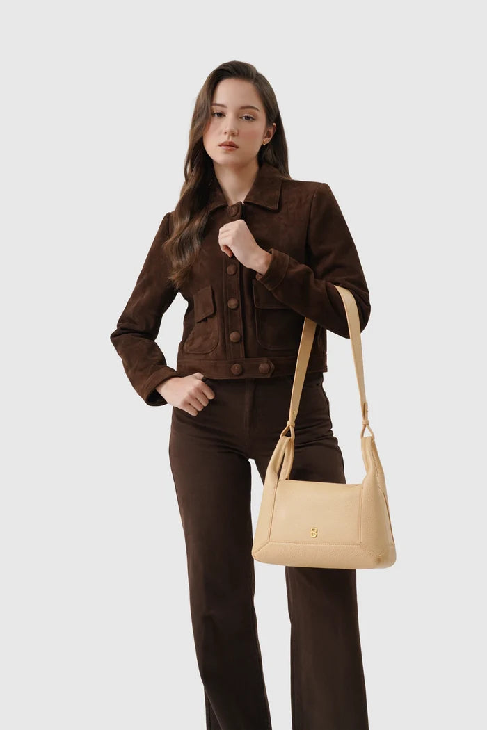 origa flex shoulder bag medium in champagne by buttonscarves carried on wrist