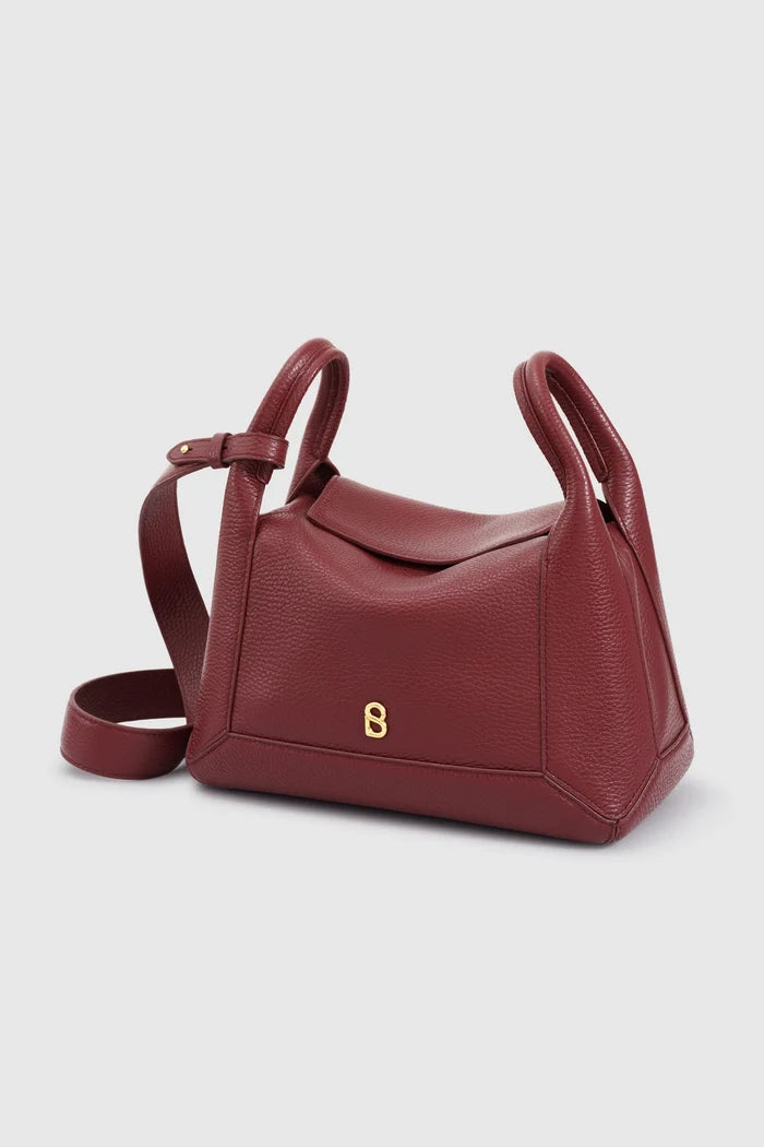 origa flex shoulder bag medium in cranberry by buttonscarves front view