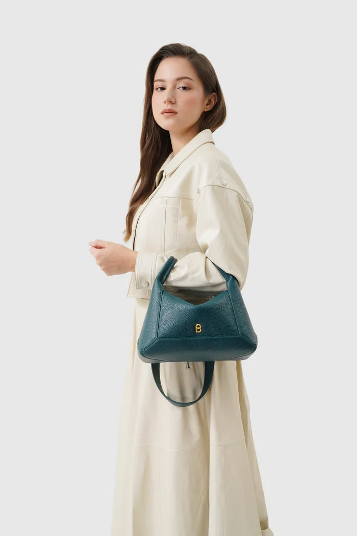 origa flex shoulder bag medium in jeans by buttonscarves carried on wrist