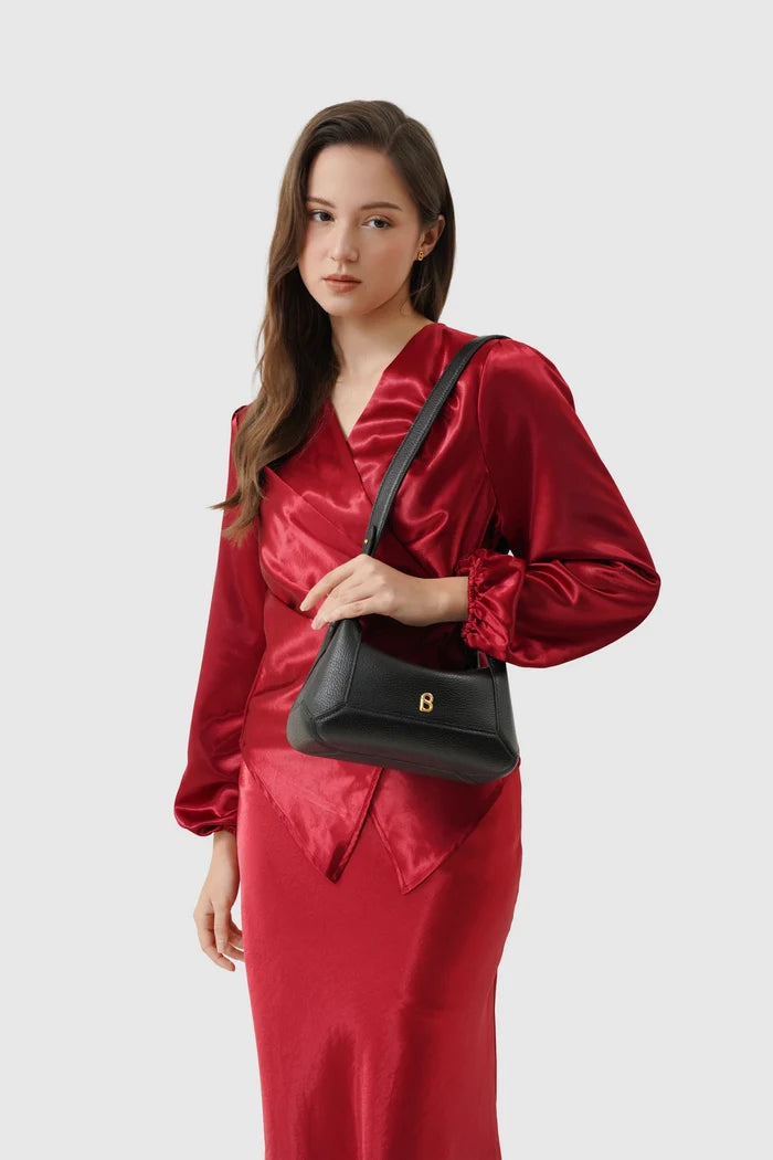 origa flex shoulder bag small in black by buttonscarves carried on shoulder