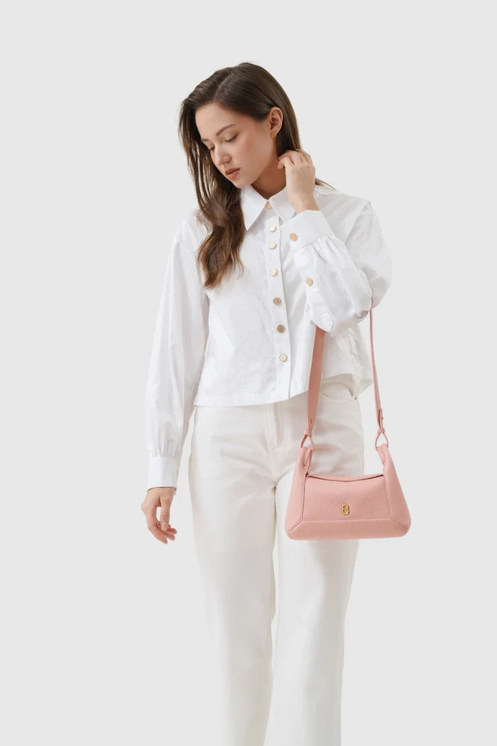 origa flex shoulder bag small in blush by buttonscarves carried on wrist