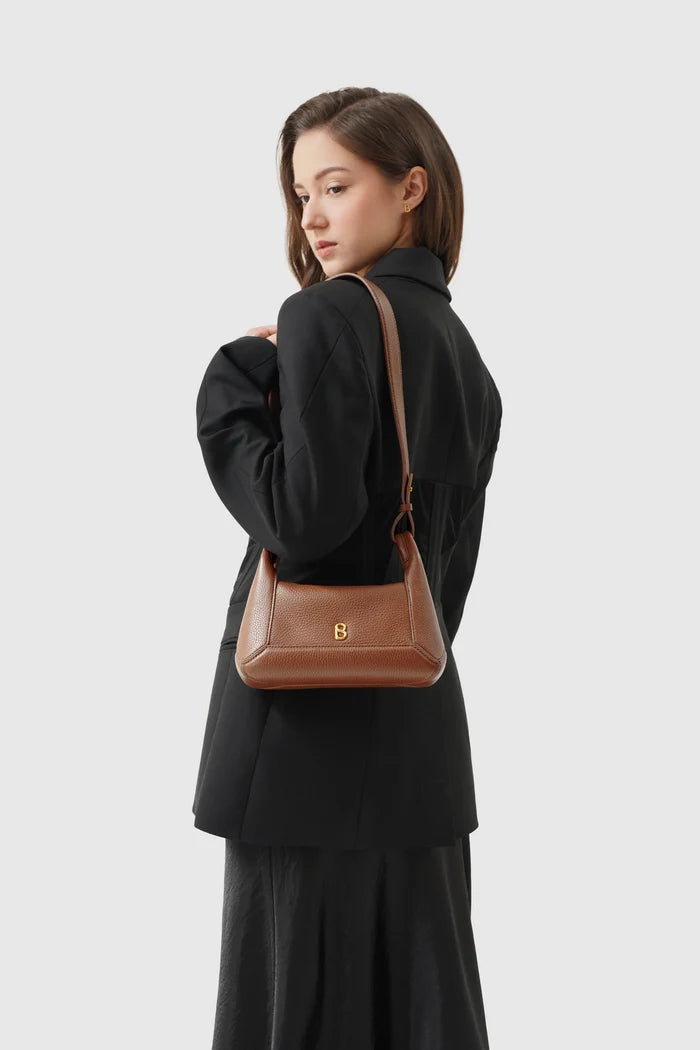 origi flex shoulder bag small in champagne by buttonscarves carried on shoulder
