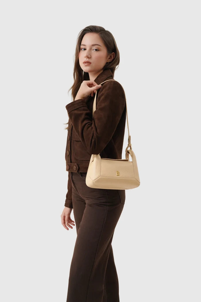 origa flex shoulder bag small in champagne by buttonscarves carried on shoulder