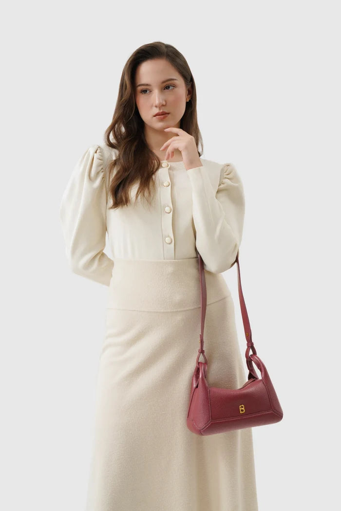 origa flex shoulder bag small in cranberry by buttonscarves carried on wrist