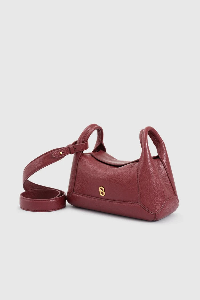 origa flex shoulder bag small in cranberry by buttonscarves front view