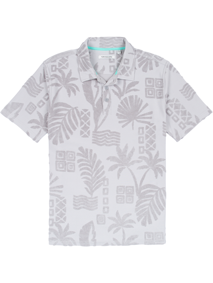 Light gray tropical-patterned cotton polo with 3D jacquard texture, front view.