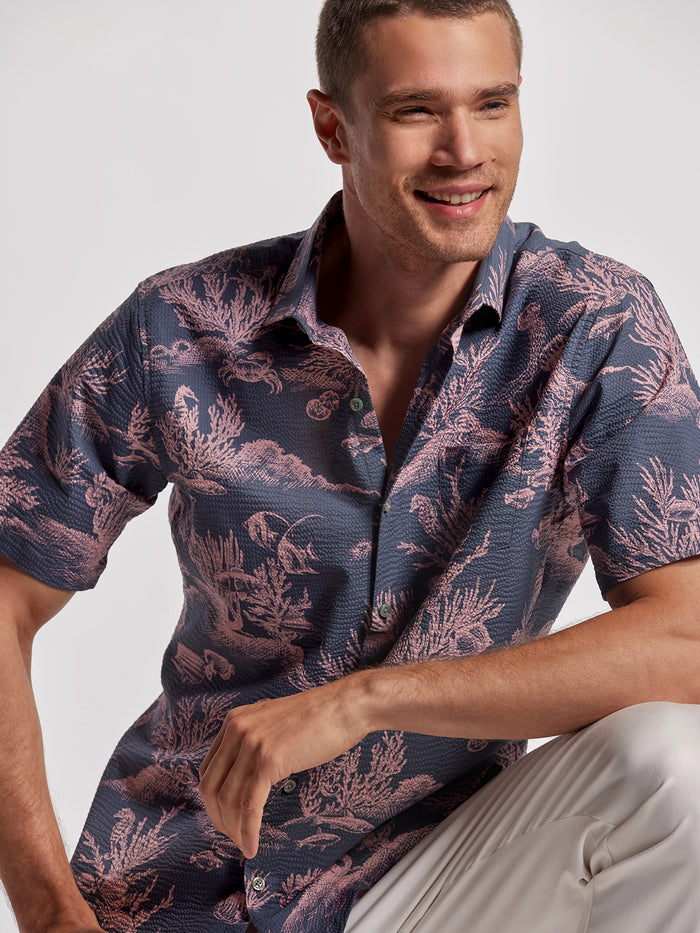Pink coral-print short-sleeve shirt, relaxed fit. Image 2: Pink coral Hawaiian shirt, front view.