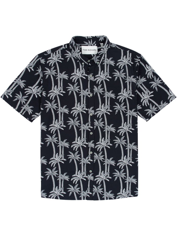 Front and back views of a black-and-white palm-print short-sleeve Hawaiian shirt.