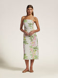 White linen midi dress with adjustable straps, shown full length on model against a plain background.
