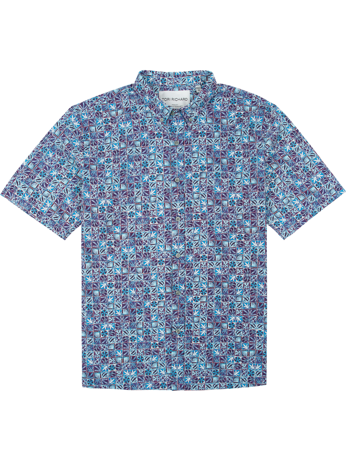 Blue, purple, and black geometric-print short-sleeve shirt, front view, moisture-wicking fabric.