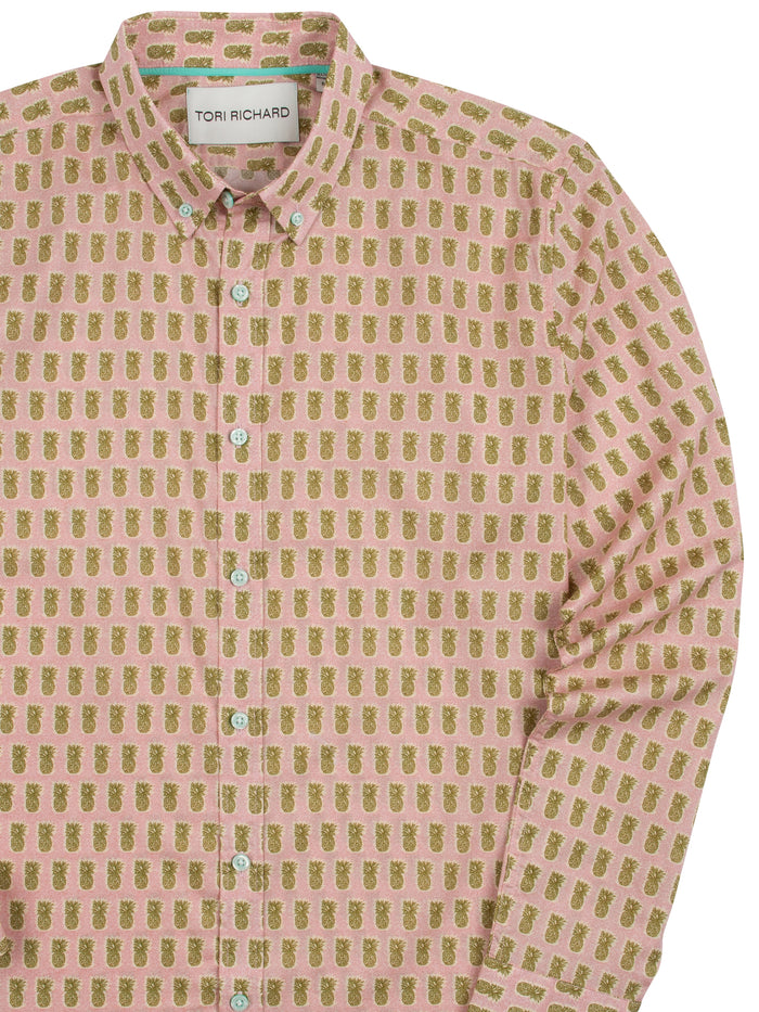 White shirt with gold pineapple print, long sleeves, shown from front and back views.