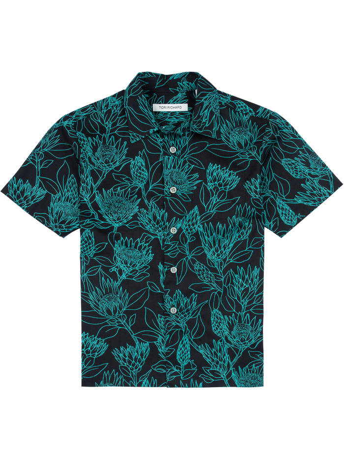 Black and teal protea-print short-sleeve button-down shirt, front view.