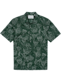Dark green and white protea-print cotton shirt with button front and collar, front view.