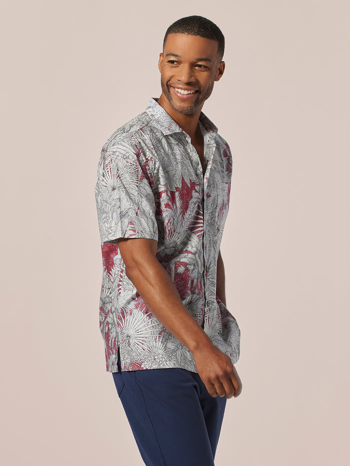 White cotton lawn short-sleeve shirt, plain front view, paired with blue pants.