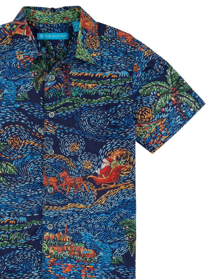 Navy tee with Starry Night, Santa’s sleigh, and tropical island print, front view.