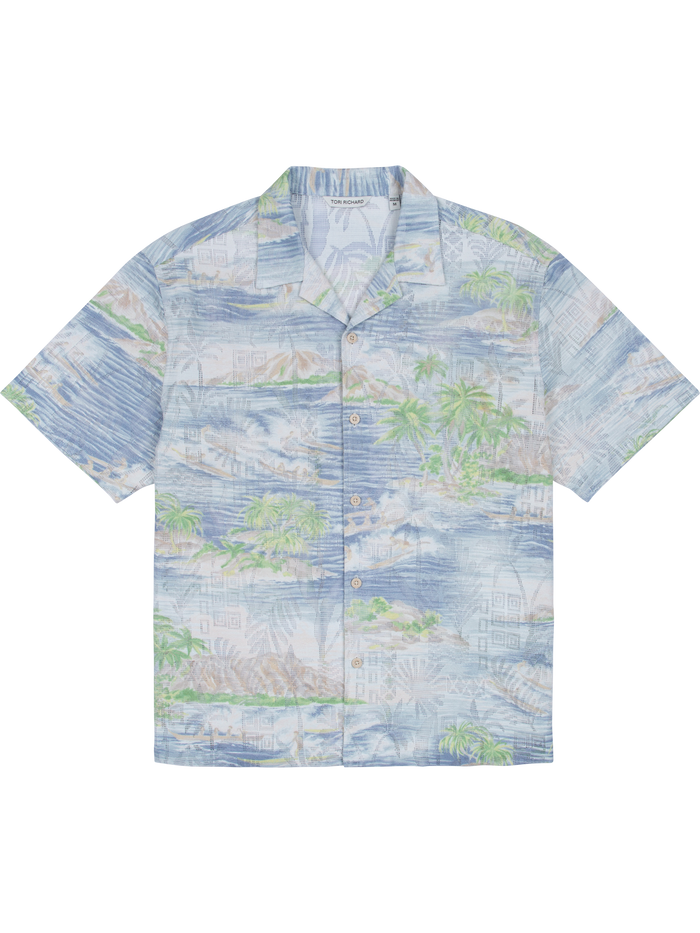 Blue and green tropical island-print short-sleeve button-up shirt, front view.