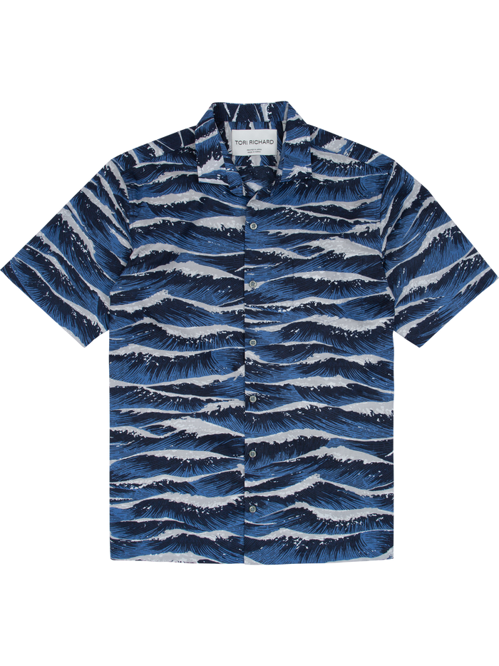 Blue ocean wave print short-sleeve cotton shirt, white collar label; flat lay, front and detail view.