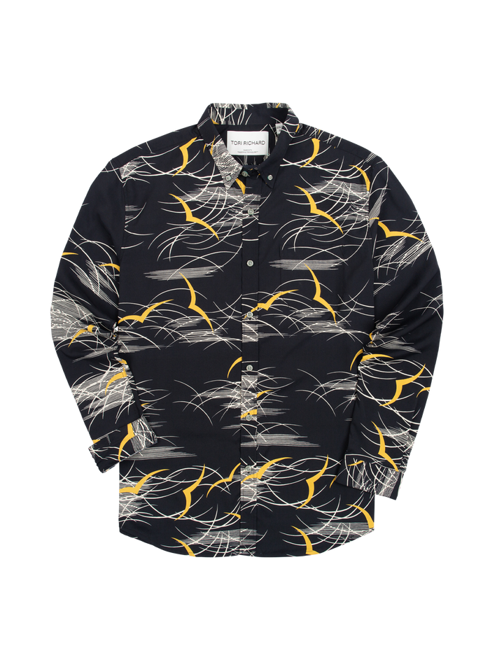 Black long-sleeve shirt with abstract wave print, and golden seagull print, flat lay front view.