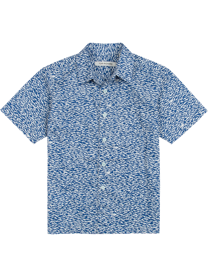 The Shark Tank - Boy's is a short-sleeve cotton shirt with a blue and white abstract print, pointed collar, relaxed fit, and button-up front, made in Hawaii.