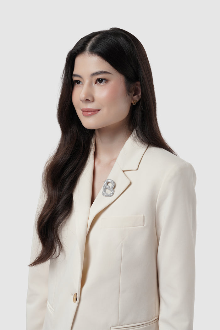 signature gala brooch package in silver by buttonscarves regular size on blazer
