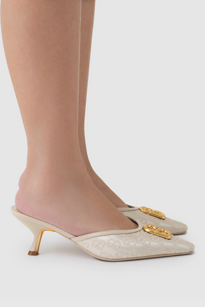 signature jacquard mules in nude by buttonscarves worn side view