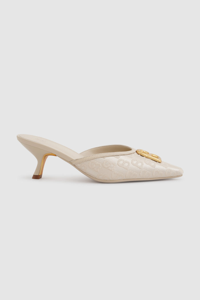 signature jacquard mules in nude by buttonscarves side view